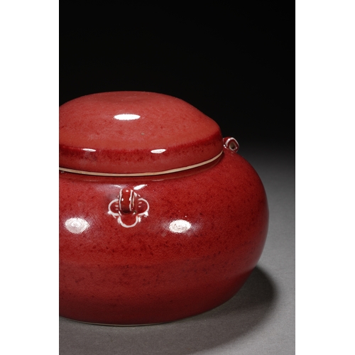 201 - A red-glazed jar with cover 17cm wide, 12cm high