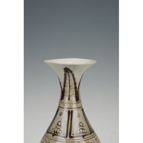 203 - A brown painted vase yuhuchunping 29cm high, 14cm wide