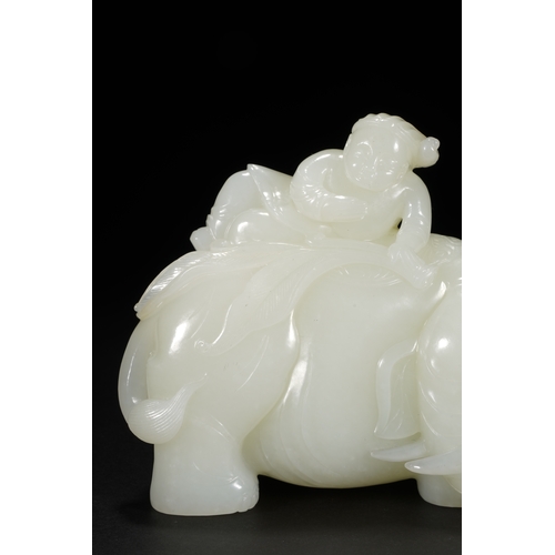 26 - A white jade carving 'boy and elephant' group, Qing Dynasty 11.5cm long, 9cm high