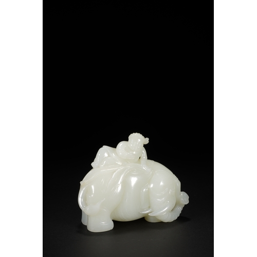 26 - A white jade carving 'boy and elephant' group, Qing Dynasty 11.5cm long, 9cm high