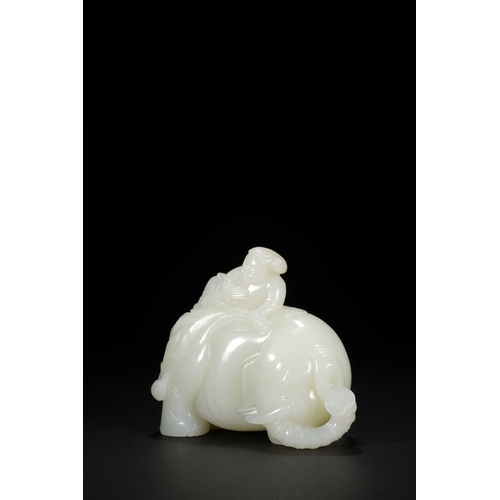 26 - A white jade carving 'boy and elephant' group, Qing Dynasty 11.5cm long, 9cm high