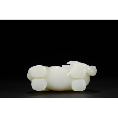 26 - A white jade carving 'boy and elephant' group, Qing Dynasty 11.5cm long, 9cm high