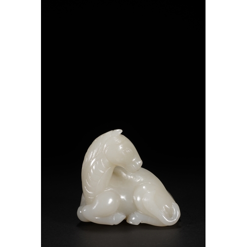 27 - A white jade carving 'horse', Qing Dynasty 8.5cm long, 7.7cm high