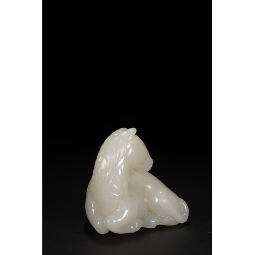 27 - A white jade carving 'horse', Qing Dynasty 8.5cm long, 7.7cm high