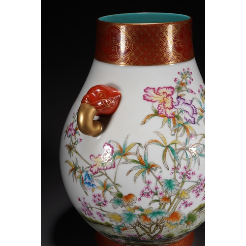 29 - A famille-rose double-handled vase 'floral and quails', Qing Dynasty 37.5cm high, 30.5cm wide... 