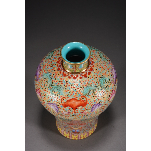 32 - A famille-rose 'eight treasures' meiping vase 21cm high, 13cm wide