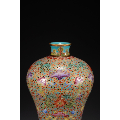 32 - A famille-rose 'eight treasures' meiping vase 21cm high, 13cm wide