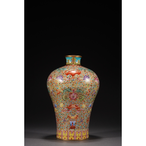 32 - A famille-rose 'eight treasures' meiping vase 21cm high, 13cm wide