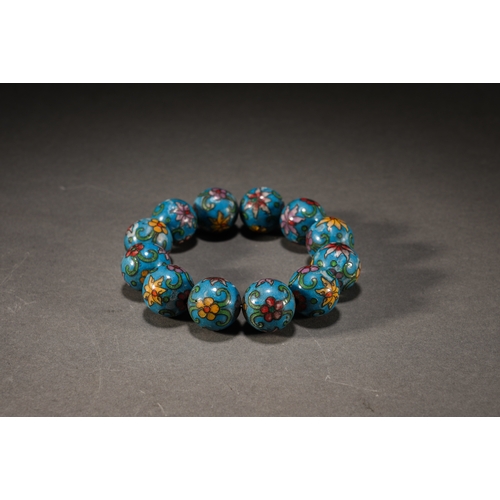 34 - A cloisonné floral bracelet, Qing Dynasty each bead approx. 2cm diameter