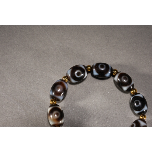 35 - A heaven beads 'Tianzhu' braceleteach bead approx. 1.8cm long