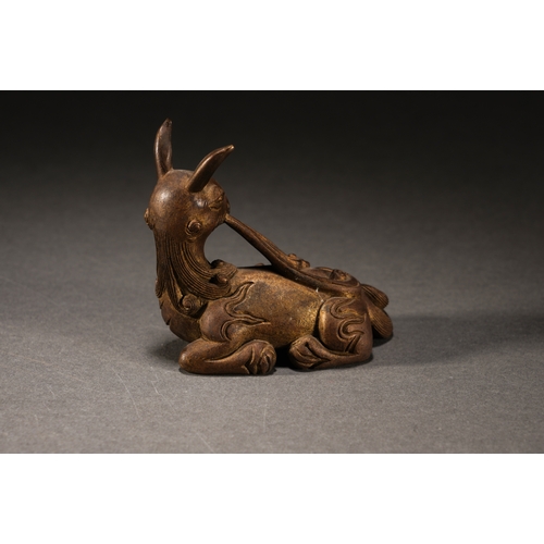 4 - A copper gilt 'mythical beast' paperweight8cm long