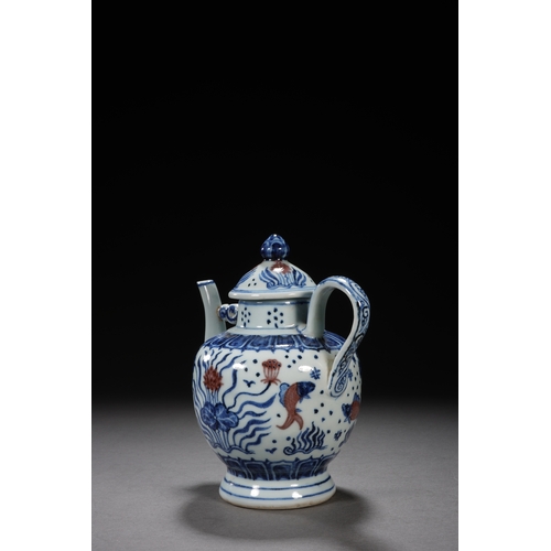 50 - A blue and white underglazed ewer 'fish and water plant' 17cm high, 16.5cm wide