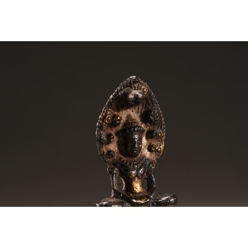 52 - A Nepalese-style bronze figure of seated Buddha, Qing Dynasty 6.3cm high