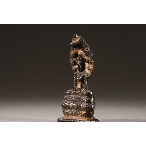 52 - A Nepalese-style bronze figure of seated Buddha, Qing Dynasty 6.3cm high