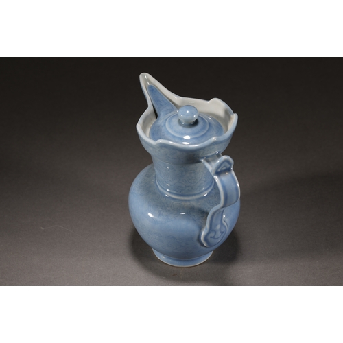 53 - A blue glazed floral ewer with lid 14.5cm high