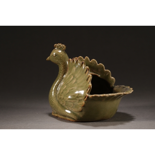 54 - A celadon glazed mandarin duck brush washer14.5cm long, 12cm high