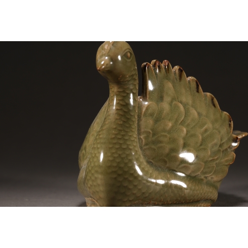 54 - A celadon glazed mandarin duck brush washer14.5cm long, 12cm high