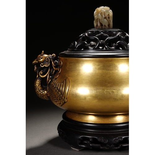 57 - A bronze incense burner 'phoenix handles' with cover and woodstand 20cm high, 21.6cm wide