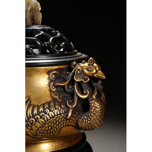 57 - A bronze incense burner 'phoenix handles' with cover and woodstand 20cm high, 21.6cm wide