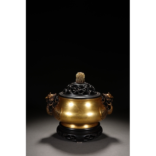 57 - A bronze incense burner 'phoenix handles' with cover and woodstand 20cm high, 21.6cm wide