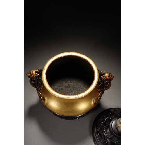 57 - A bronze incense burner 'phoenix handles' with cover and woodstand 20cm high, 21.6cm wide