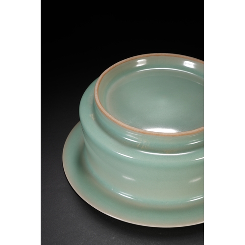 60 - A celadon glazed brush washer 18cm diameter, 7cm high