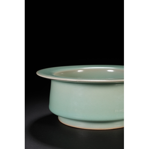 60 - A celadon glazed brush washer 18cm diameter, 7cm high