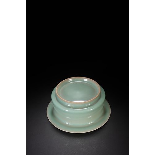 60 - A celadon glazed brush washer 18cm diameter, 7cm high