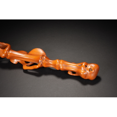 62 - A boxwood ruyi sceptre, Qing Dynasty 31.5cm long