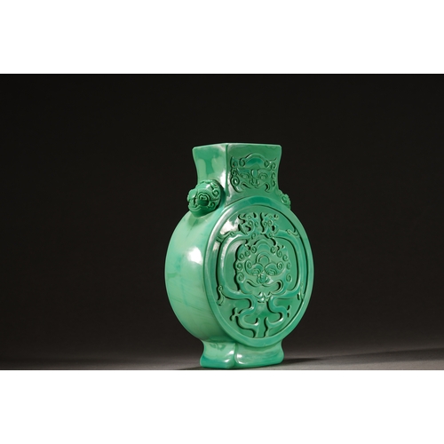 63 - A turquoise Peking glass moon flask, Qing Dynasty 21cm high