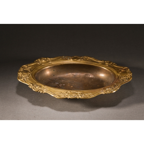 64 - A carved copper fruit tray 33.5cm long