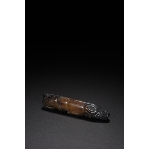 66 - An archaistic style jade carving 'pig' 9cm long