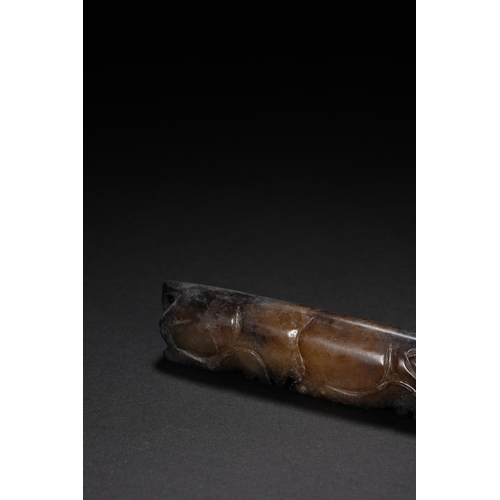 66 - An archaistic style jade carving 'pig' 9cm long