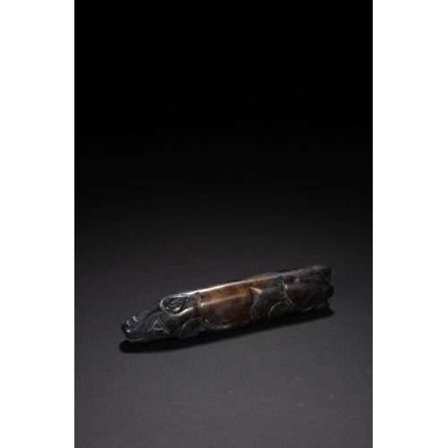 66 - An archaistic style jade carving 'pig' 9cm long