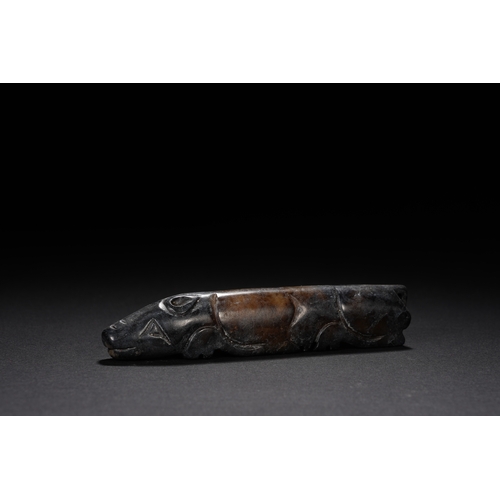 66 - An archaistic style jade carving 'pig' 9cm long