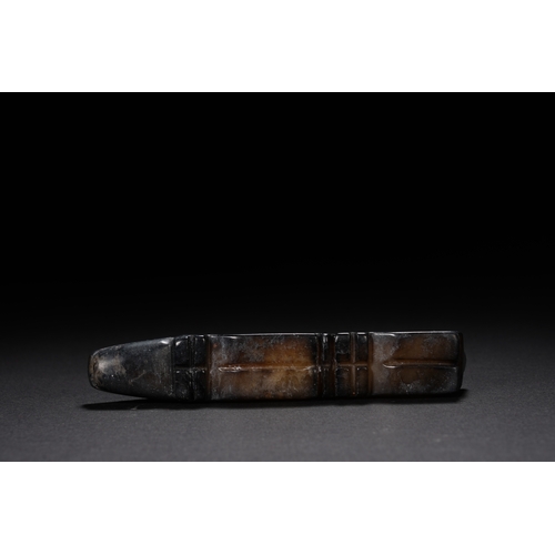 66 - An archaistic style jade carving 'pig' 9cm long