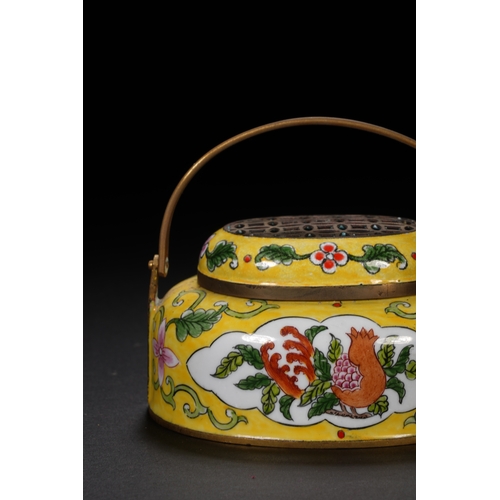 67 - A painted enamel hand warmer with qianlong six-character mark8.3cm long, 7.5cm high