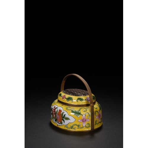 67 - A painted enamel hand warmer with qianlong six-character mark8.3cm long, 7.5cm high