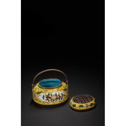 67 - A painted enamel hand warmer with qianlong six-character mark8.3cm long, 7.5cm high