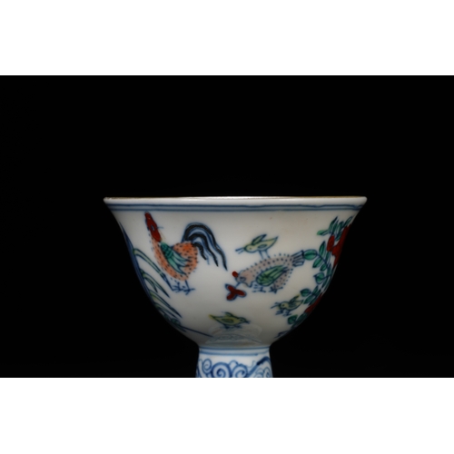 71 - A wucai stem cup with gilt liner, Qing Dynasty 7.5cm diameter, 8cm high