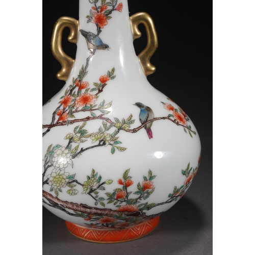 73 - A famille-rose double-handled vase 'floral and quails', Qing Dynasty 23cm high, 15cm wide