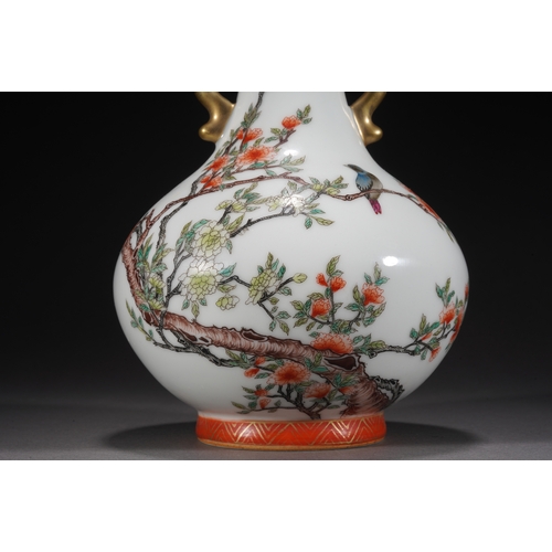 73 - A famille-rose double-handled vase 'floral and quails', Qing Dynasty 23cm high, 15cm wide