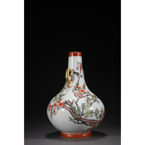 73 - A famille-rose double-handled vase 'floral and quails', Qing Dynasty 23cm high, 15cm wide