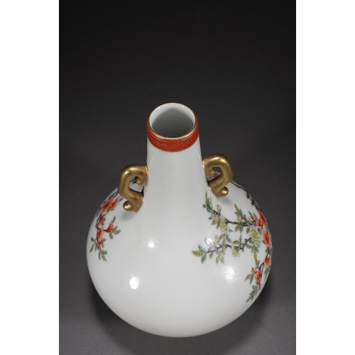 73 - A famille-rose double-handled vase 'floral and quails', Qing Dynasty 23cm high, 15cm wide