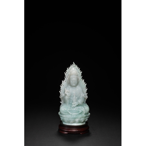 76 - A jadeite seated Guanyin, Qing Dynasty 16.5cm high, 7.5cm wide