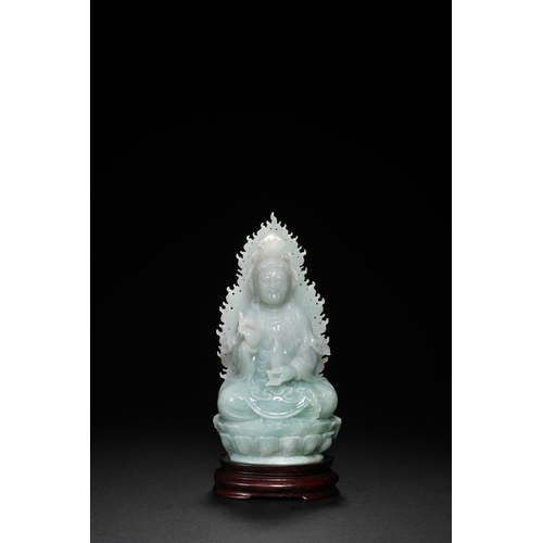 76 - A jadeite seated Guanyin, Qing Dynasty 16.5cm high, 7.5cm wide