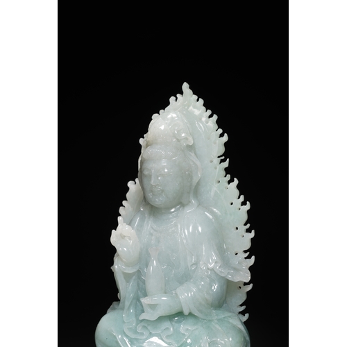 76 - A jadeite seated Guanyin, Qing Dynasty 16.5cm high, 7.5cm wide