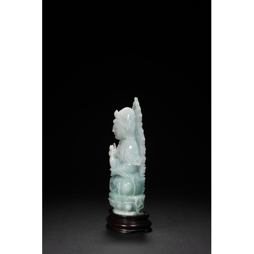 76 - A jadeite seated Guanyin, Qing Dynasty 16.5cm high, 7.5cm wide