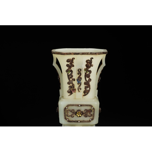 80 - A white jade with silver inlay and gilt flower gu-form vase, Qing Dynasty 21cm high, 11.5cm wid... 