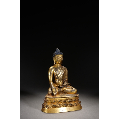 81 - A gilt bronze seated statue of Shakyamuni Buddha, Qing Dynasty 25cm high, 18cm wide